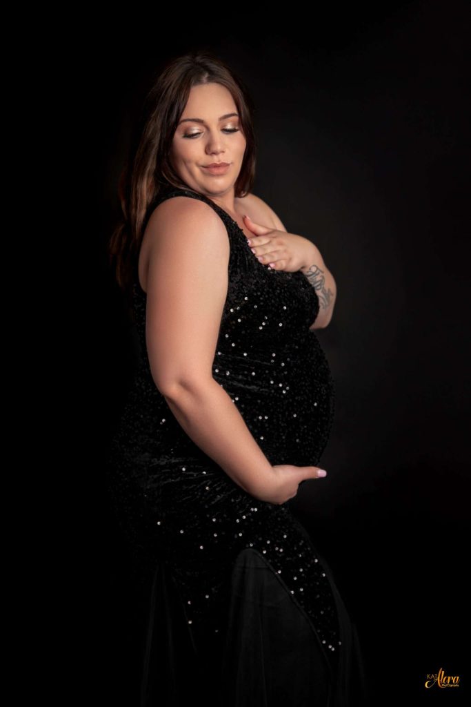 Affordable maternity photography Cranbourne by Kat Alora Photography featuring an expecting mother in a luxury maternity gown at Cranbourne North studio