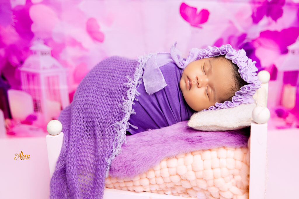 Sleeping newborn wrapped in blanket Cranbourne Melbourne newborn photography