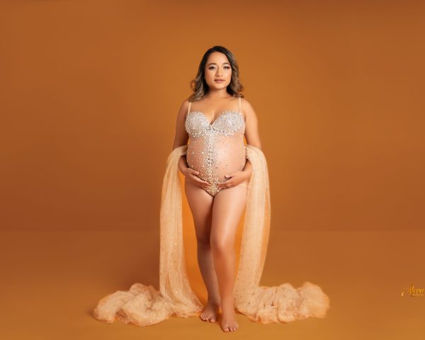 Pregnant mother posing during affordable maternity photography session in Melbourne studio